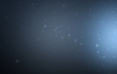 Floating particles of powder on dark background.