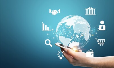 Businessman hold smartphone connecting with globe icon