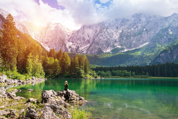 Sunrise view on Bernese range above Bachalpsee lake. Highest peaks Eiger, Jungfrau and Faulhorn in...