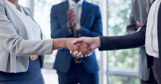 Business people, handshake and meeting for partnership, hiring or welcome with team in applause at office. Group shaking hands for deal, agreement or introduction in teamwork recruiting at workplace
