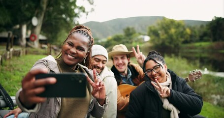 Camping, peace sign and selfie of friends in nature on outdoor holiday, vacation and adventure. Memories, travel and happy men and women take picture by lake in woods or forest for social media post