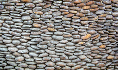 Several equal-sized rocks stacked in layers.