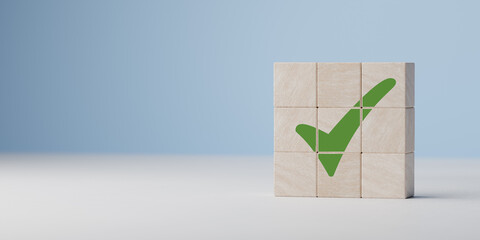 Wooden cube with green checkmark icon. Check mark, Check Mark Sign, Tick Icon, right sign,circle green checkmark button, Done. On blue background. Banner. Copy space - obrazy, fototapety, plakaty