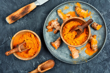 Turmeric powder and root.