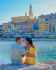 Menton France, men and woman on vacation at the Cote d Azur France, View on the old part of Menton,...