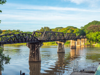 .The train is passing through the Death Railway Bridge over the River Kwai in Kanchanaburi. .During...