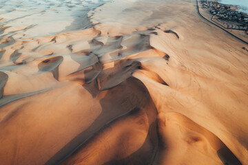 Fototapeta na wymiar Aerial Dune Textures of Namibian Desert, sunset at Swakopmund, Namibia, Africa