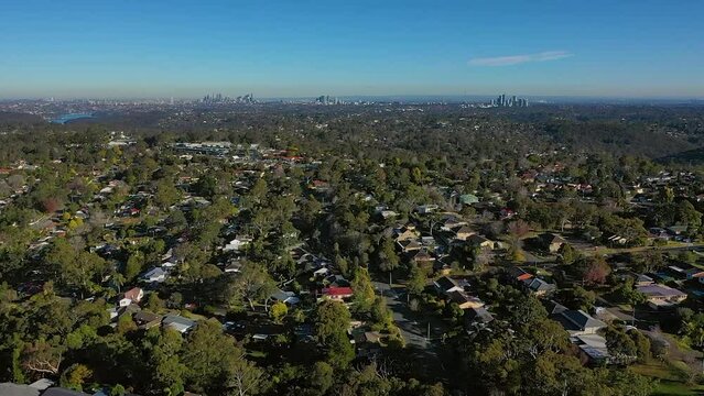 Drone aerial view of suburban houses and streets in the Northern Beaches
