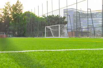 A soccer field view from outside the fence, focusing on the field., after some edits.