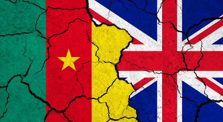 Flags of Cameroon and United Kingdom on cracked surface - politics, relationship concept