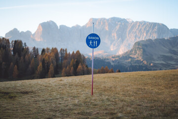 Sign of Sanon Rifugio, Alpe di Siusi sunrise in The Dolomites South Tyrol Italy