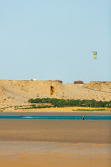 Dakhla, Morocco - 22 June 2022 : People Practicing Kitesurf on the Beach of Dakhla in the south of Morocco