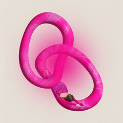 Creative image of young women lies on intarlaced bright pink rings over pastel beige background.