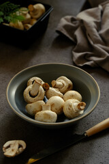 fresh champignos mushroom on the table