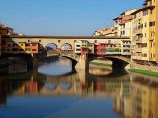 Fototapeta na wymiar The Ponte Vecchio (Old Bridge) in Florence, Italy, seen on a clear sunny day. Frontal view. Travel photography