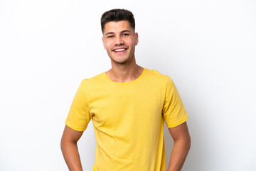 Fototapeta premium Young caucasian man isolated on white background laughing