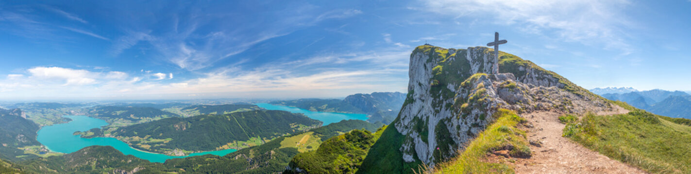 landscape with top of Mount Schafberg with cross and mountains and Lake Mondsee and Attersee, Alps, Austria