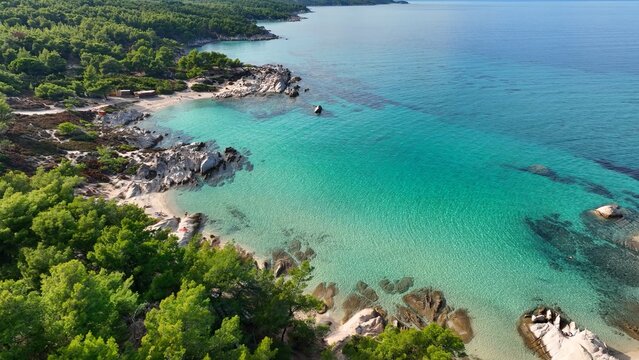 Beautiful orange beach Kavourotripes , Sitonia, Halkidiki, Greece. Aerial shot of lagoon with turquoise water, sandy beach and pine trees 2