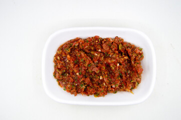 spicy turkish appetizer made with tomato, parsley and pepper