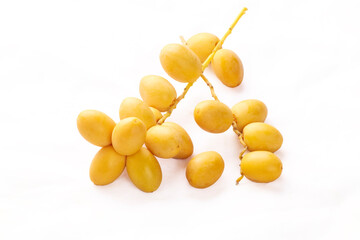 Yellow raw date palm isolated