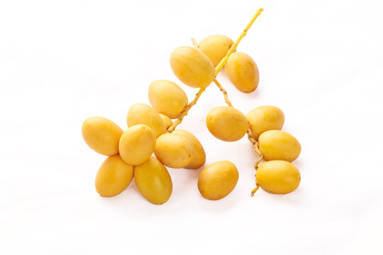 Yellow raw date palm isolated