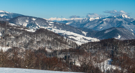 Western Tatras and Velky Choc from hiking trail between Vysna Revuca and sedlo Ploskej in winter Velka Fatra mountains