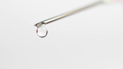 Vaccine Injection Shot Syringe Drops Close-Up © maradek