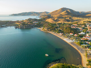 Fototapeta premium Aerial view of Riha Nera beach of Myrina on the island of Lemnos with Avlonas in the background.