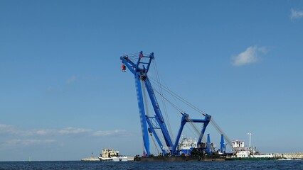Floating Crane Vessel On A River And Sea