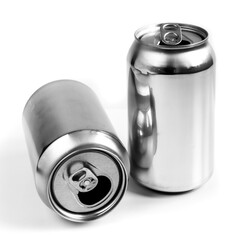 Two aluminum cans for beverage. Still-life picture of some metallic containers isolated on white background.