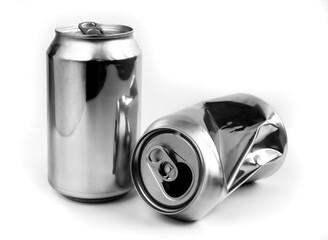 Two aluminum crushed cans for beverage. Still-life picture of some metallic containers isolated on white background.
