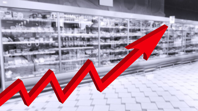 Red growing up large arrow on abstract blur image of supermarket background. Bar chart and graph. Rising food price. Inflation concept. Retail industry. Stock Market. Grocery Store. Forecast. CPG.