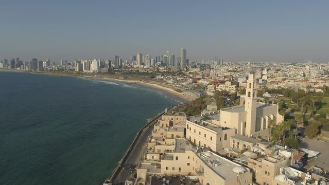 Aerial view of Jaffa old city port and marina coastline with general view of both Jaffa and Tel Aviv