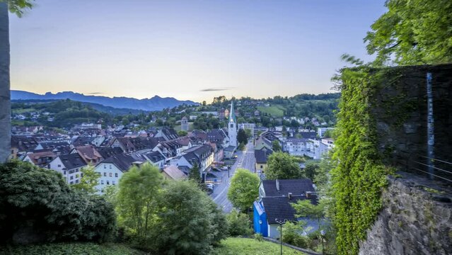 City of Feldkirch in the State of Vorarlberg, Austria. View from the Schattenburg. Timelapse Video day to night transition.