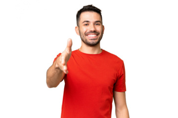 Young handsome caucasian man over isolated chroma key background shaking hands for closing a good deal