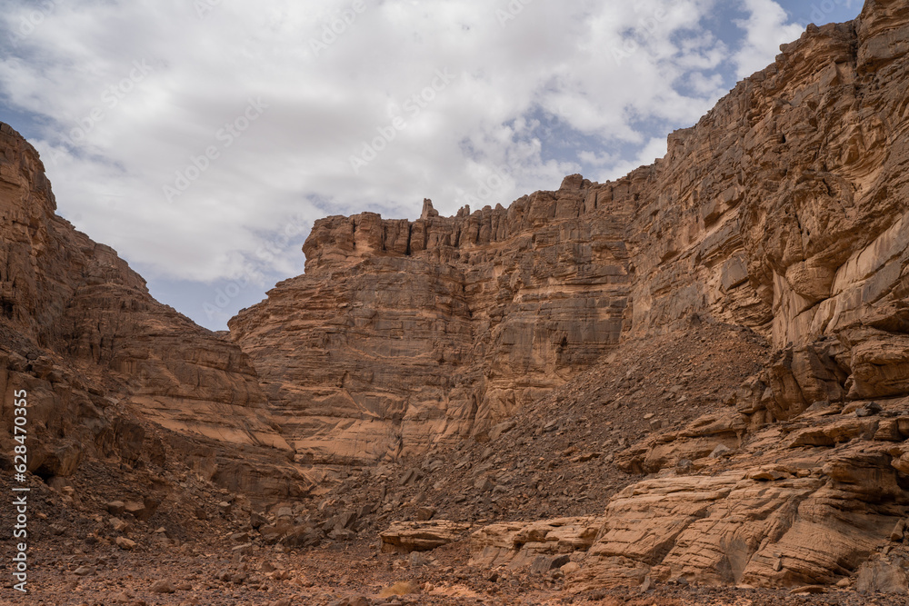 Sticker iew in the Sahara desert of Tadrart rouge tassili najer in Djanet City  ,Algeria.colorful orange sand, rocky mountains