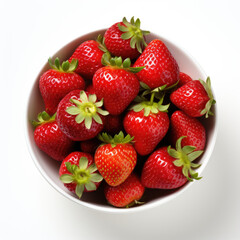 Fresh strawberries in a white bowl on white background