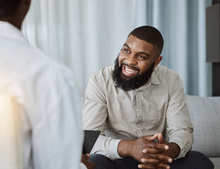 Happy black man, therapist and consultation in meeting for healthcare, mental health or therapy at the hospital. African male person talking to consultant in physiology, counseling or medical help