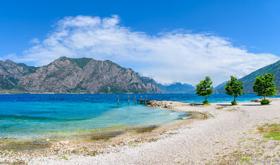 Landscape with Campagnola beach, Garda Lake, Italy - obrazy, fototapety, plakaty