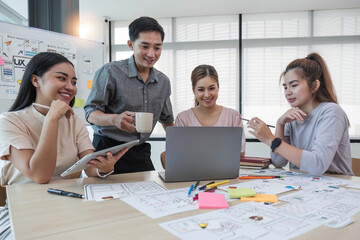 Asian office team brainstorming, plan for solution idea, Group of asia creative teamwork and woman leader at business meeting for developing mobile phone app, ux, ui start up, small business
