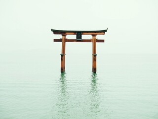 Japanese torii of shrine in water