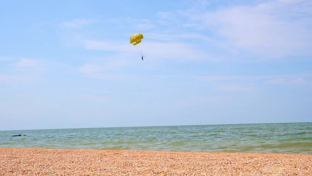 Parasailing is a popular pastime in many resorts around the world. The active form of relaxation.