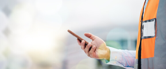 Phone, architecture and hands of person on construction site for engineering, space and...