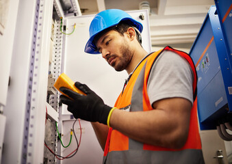 Electrician, energy and inspection with man in control room for multimeter, mechanic and safety. Electricity, engineering and power with technician and check for generator, maintenance and circuit
