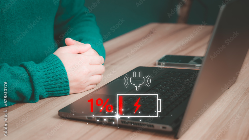 Poster User is angry and frustrated when he learns that his laptop computer's battery is dead and did not bring the charger adapter. Concept of Technology and daily life of freelance. No power battery.