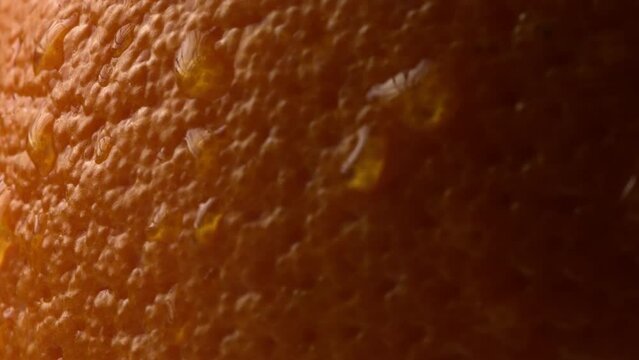 Close up of grapefruit or orange fruit texture close up macro. 4K ProRes