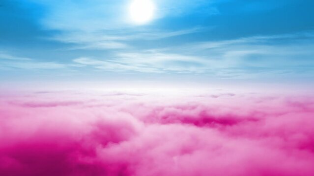 Beautiful colourful cloudscape. View over or above amazing heaven like clouds. Fluffy soft pink and purple fairy tale sunrise or sunset sky moving. Like paradise