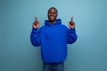 confident young black american man in casual clothes with an idea and a strategy