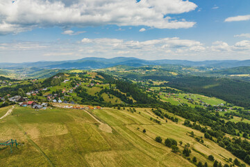 Fototapeta na wymiar View of the Beskids on a beautiful summer day. The region of Poland, the Czech Republic and Slovakia.