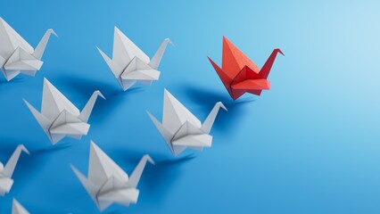 Boss vs Leader concept. White origami birds behind red one on blue background.3D rendering on blue background.
